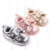 Shiny bow baby shoes
